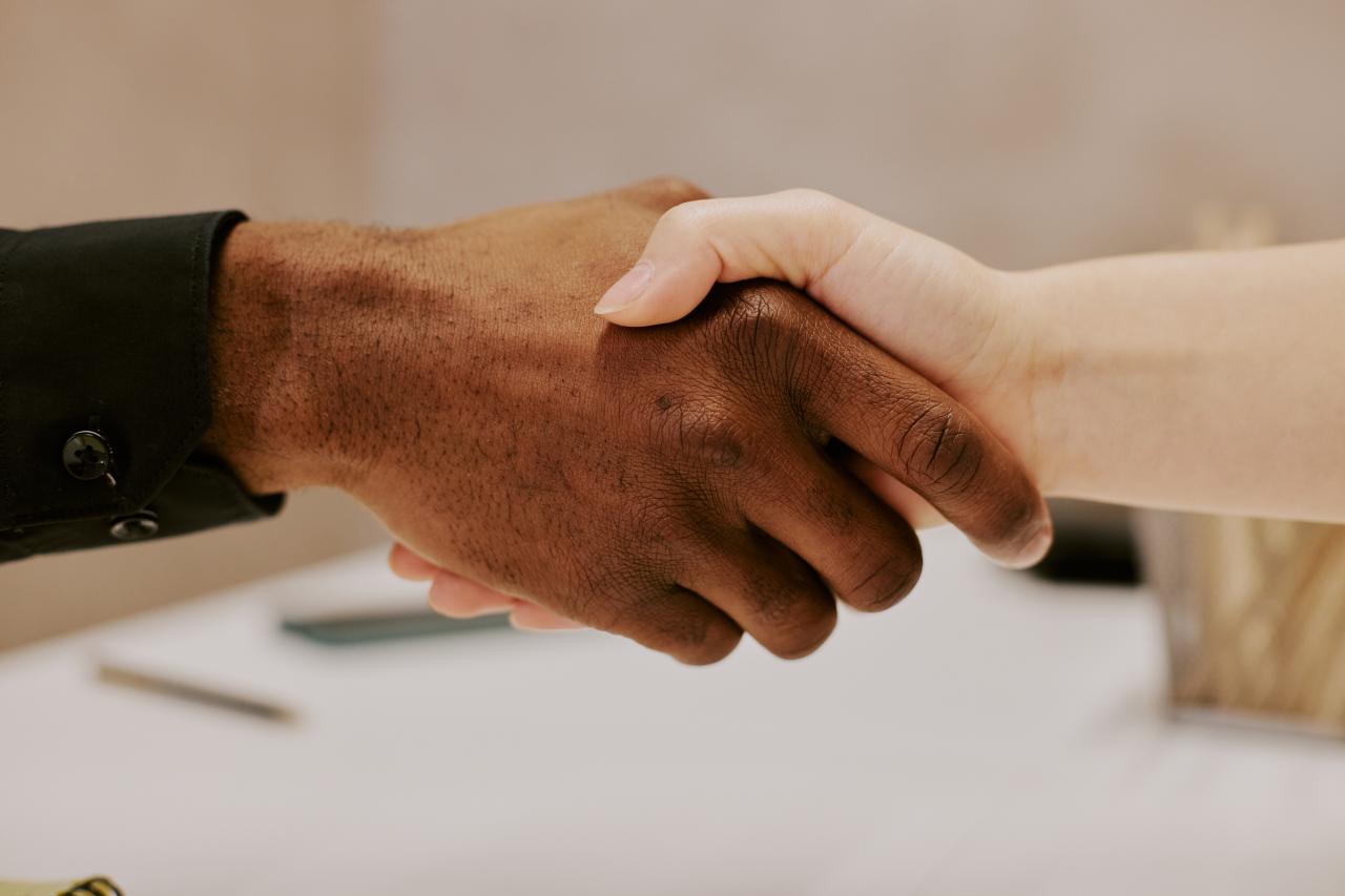 two people shaking hands